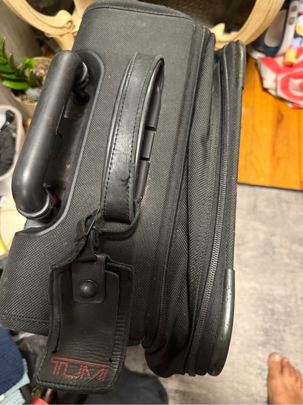 Tumi Black Expandable Carry-On with Leather ID Tag